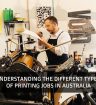 a man working in printing machinery